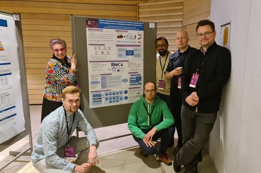 six persons in front of a poster